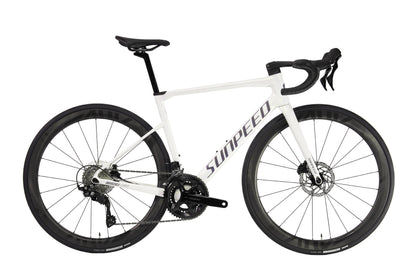 VRIDE Invincible Expert All Road bike with Shimano 105 carbon rim, adult bicycle showing sleek frame and lightweight wheel design.