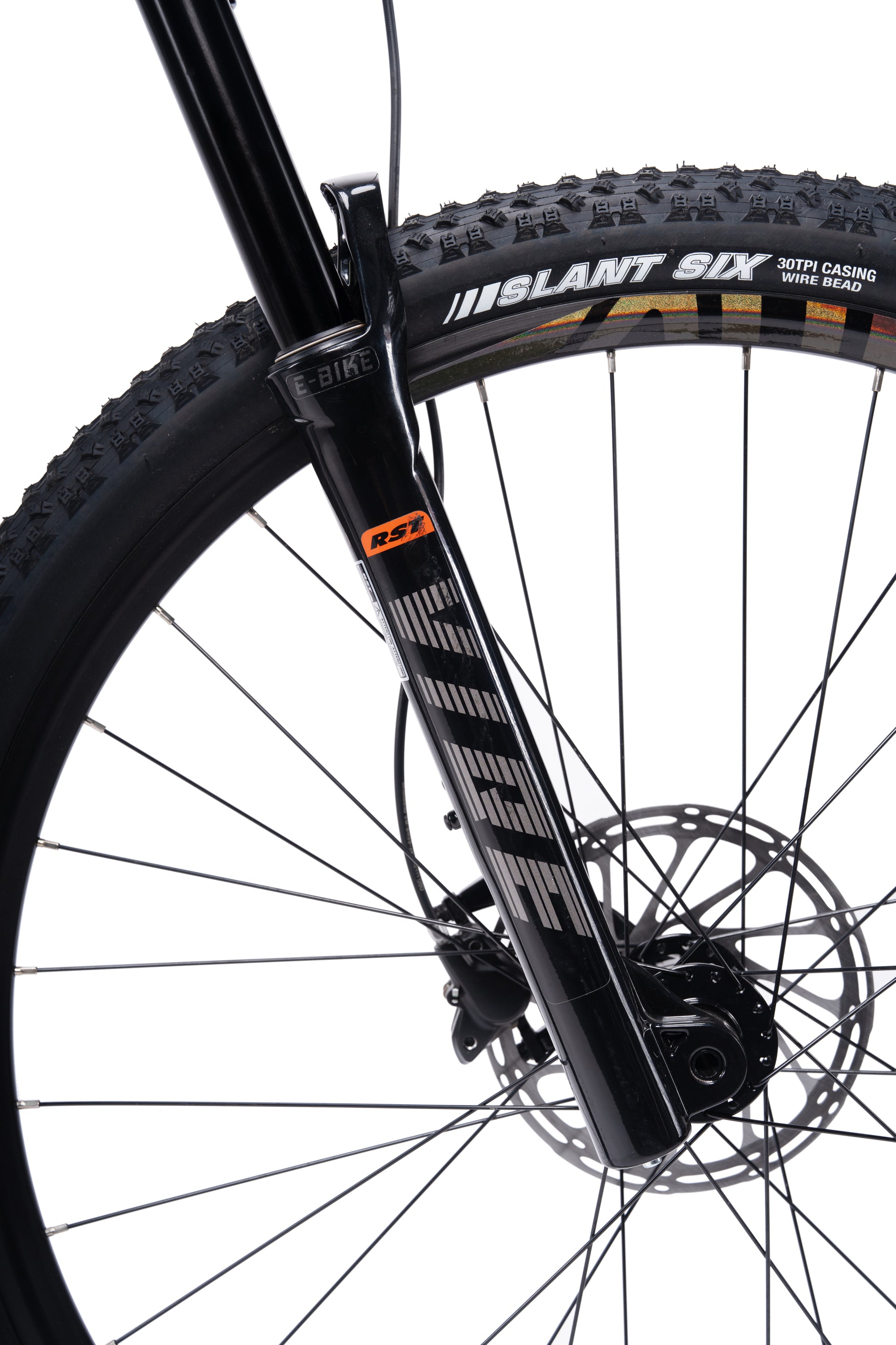 VRIDE Knight Pro full-suspension mountain bike with Shimano Deore gears, black frame, and knobby tires for off-road riding.