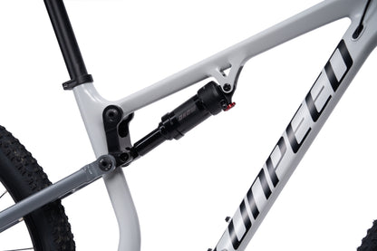 VRIDE Knight Pro full-suspension mountain bike with Shimano Deore gears, shown with sturdy frame and knobby tires for off-road riding.
