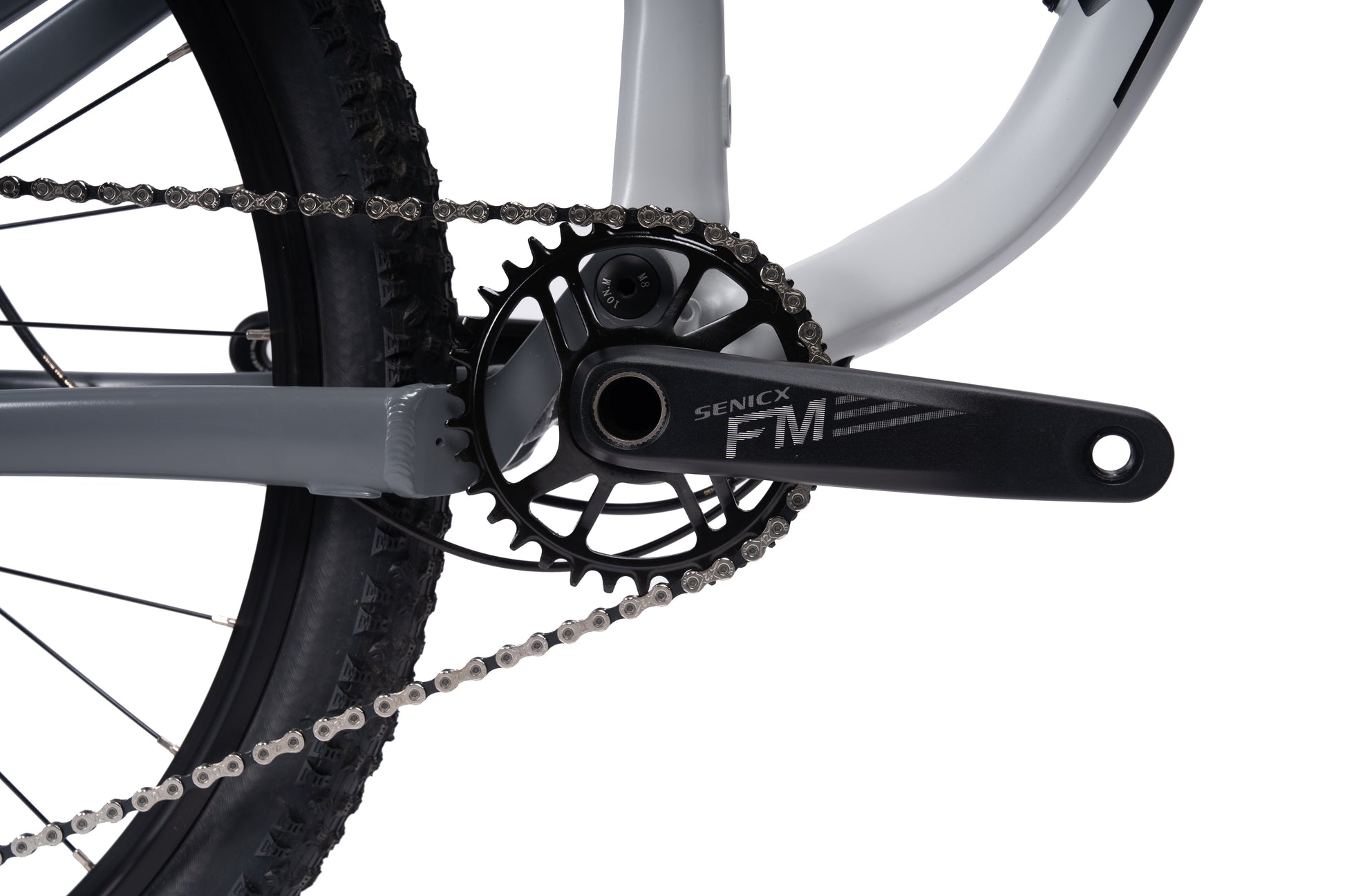 VRIDE Knight Pro full-suspension mountain bike with Shimano Deore gears, shown in a natural outdoor setting.