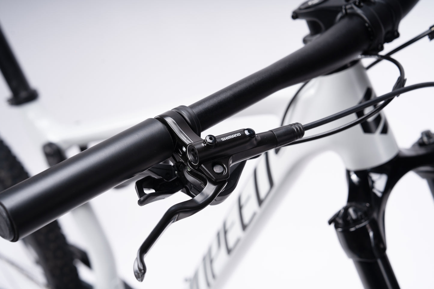 VRIDE Knight Pro full-suspension mountain bike with Shimano Deore gears, adult-sized frame, black and green design, ready for trail riding.