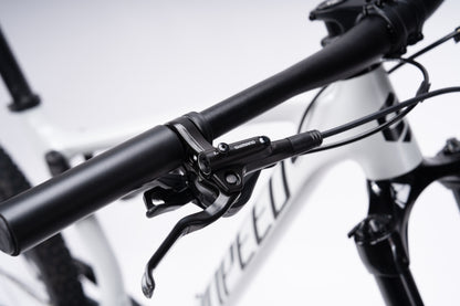 VRIDE Knight Pro full-suspension mountain bike with Shimano Deore gears, adult-sized frame, black and green design, ready for trail riding.