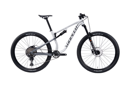 VRIDE Knight Pro full-suspension mountain bike with Shimano Deore gears, shown from side view on a trail.